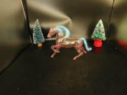 pink horse blue mane side